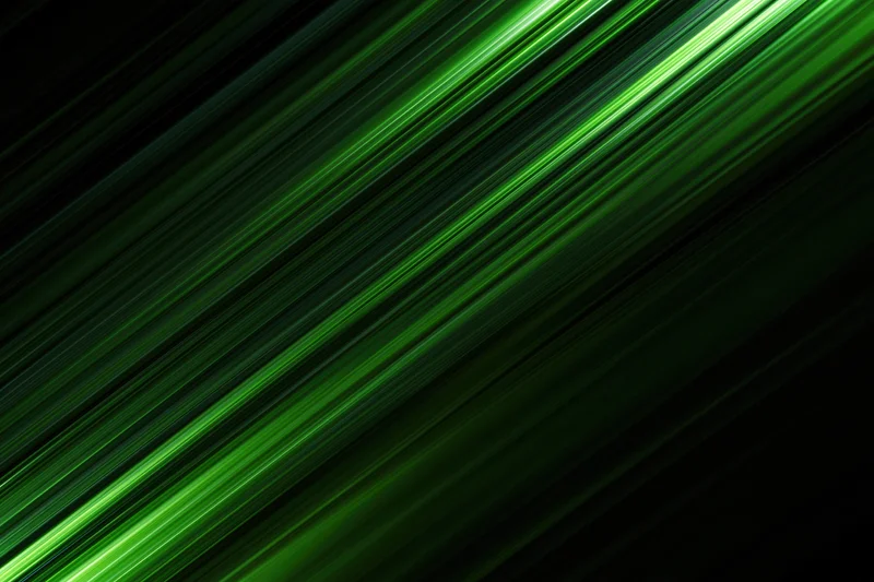 Diagonal streaks of bright green light cutting across a dark background