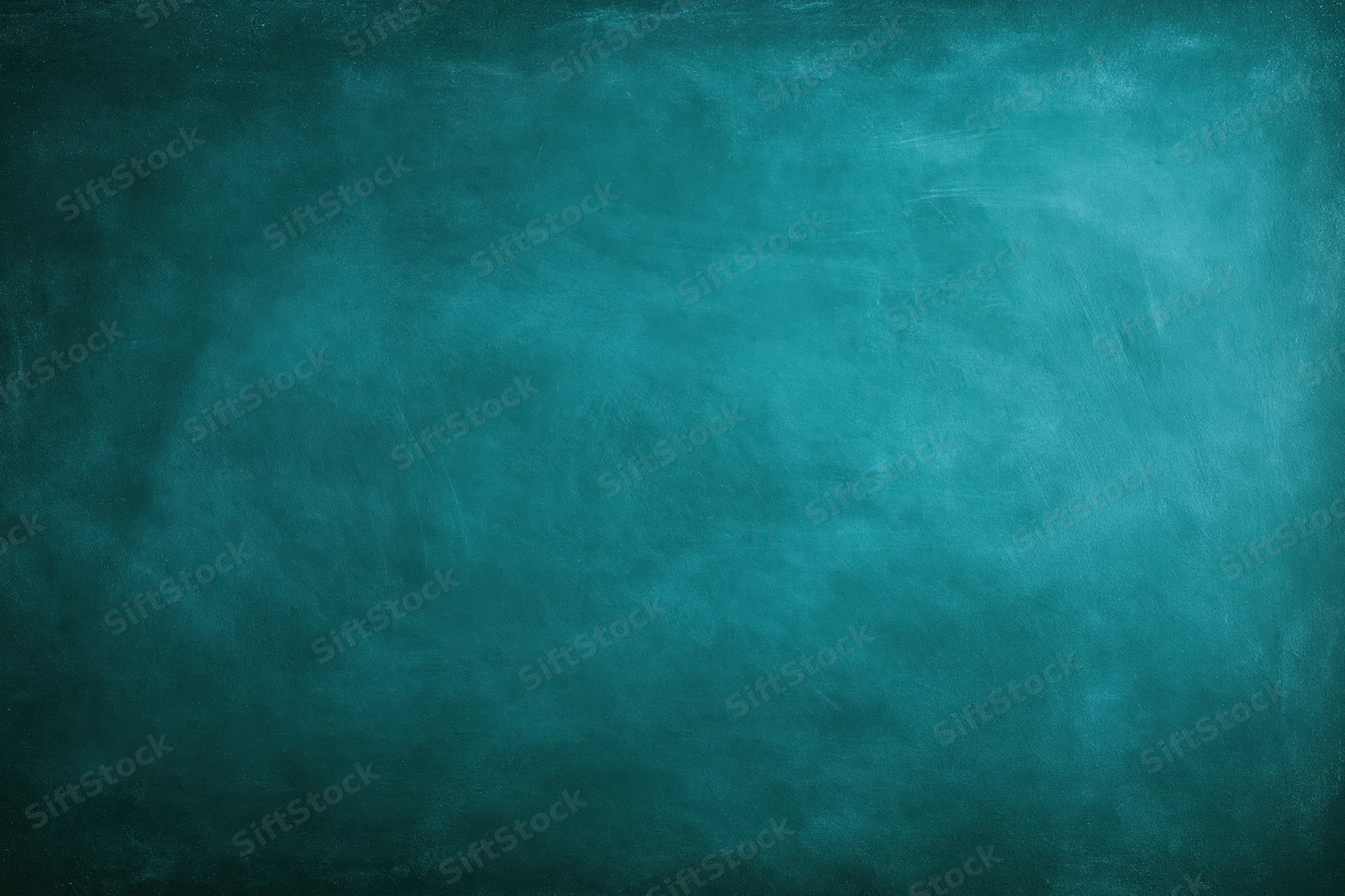 Dark teal chalkboard surface filling the frame with no writing or marks