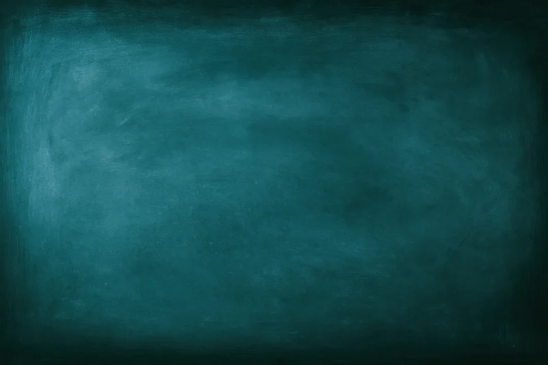 Dark teal chalkboard surface filling the frame with no writing or marks