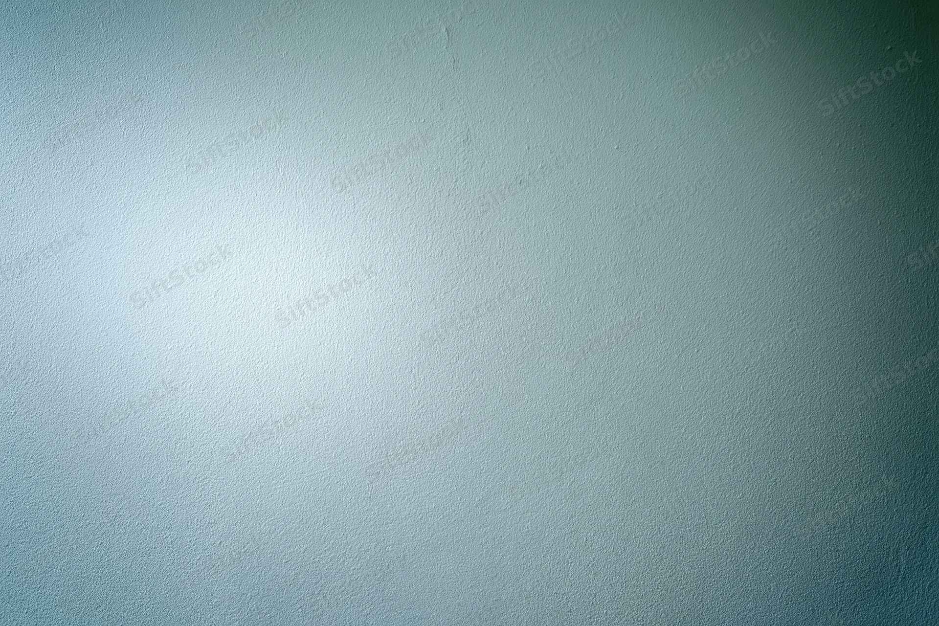 Plain painted wall surface filling the frame with even lighting and subtle texture