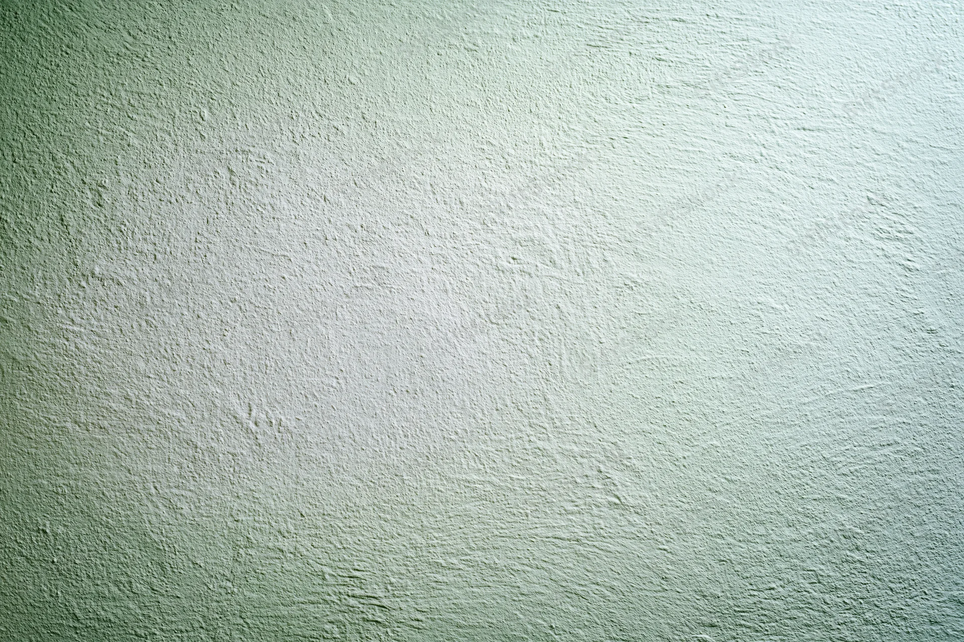 Plain painted wall surface filling the frame in a flat closeup view