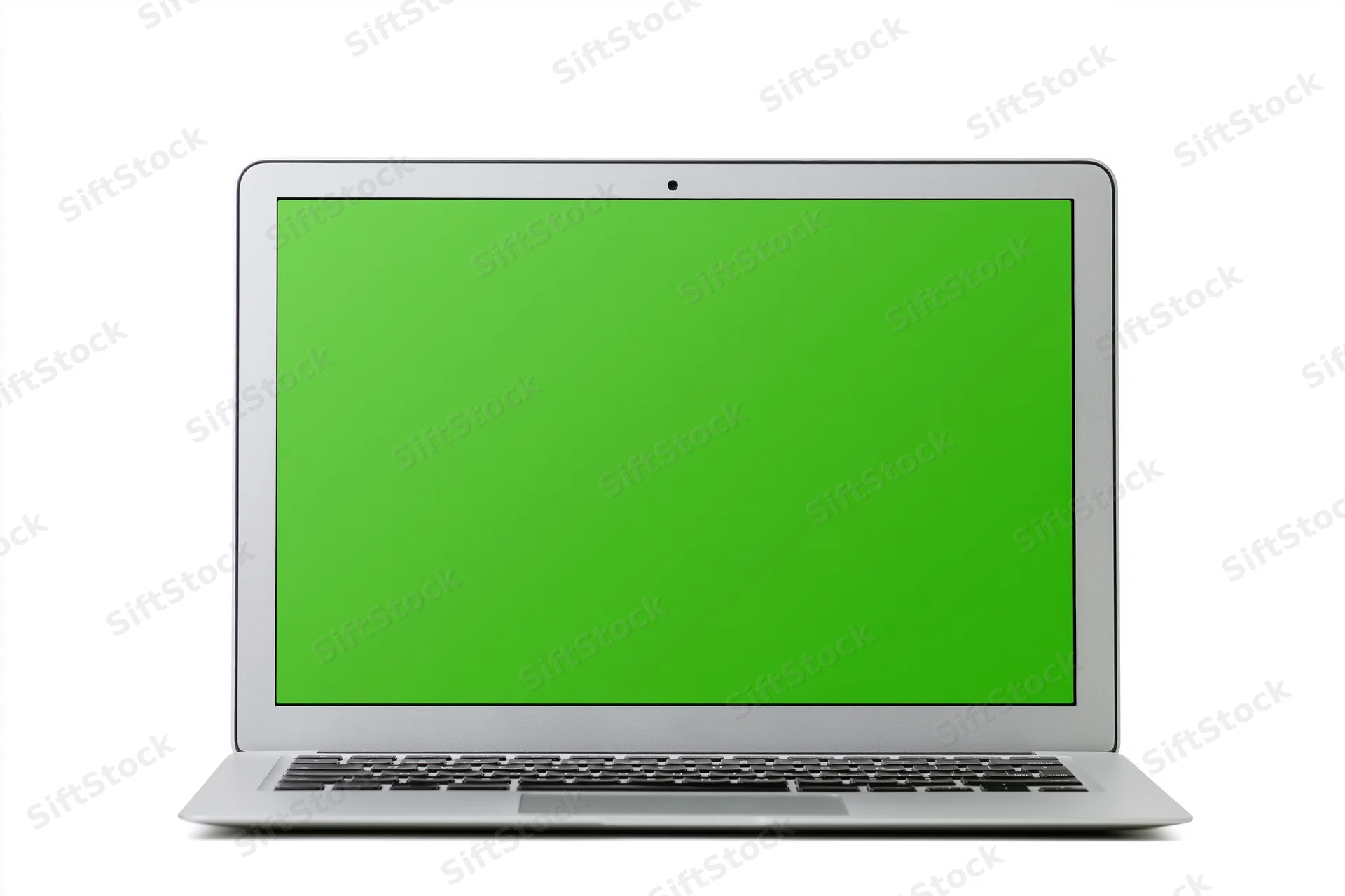 Silver aluminum laptop open face-on with green screen display isolated on white background