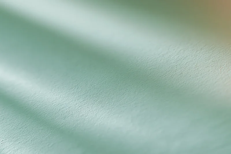 Smooth abstract gradient background with soft blurred texture in mint green tones