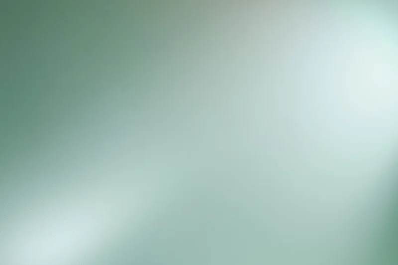 Smooth abstract gradient background with soft blurred transition from green to white