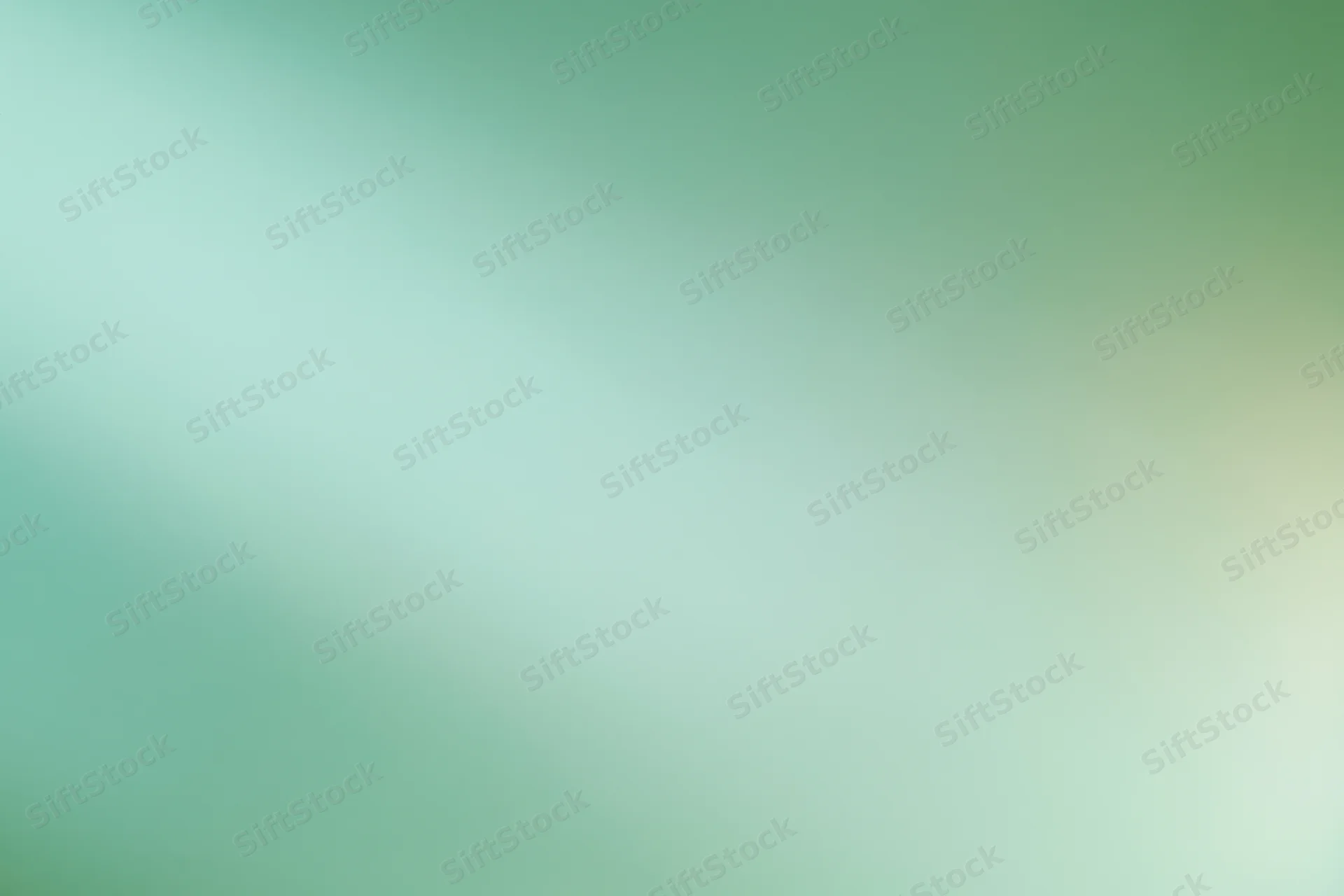 Smooth abstract gradient background with soft blurred transition from green to teal