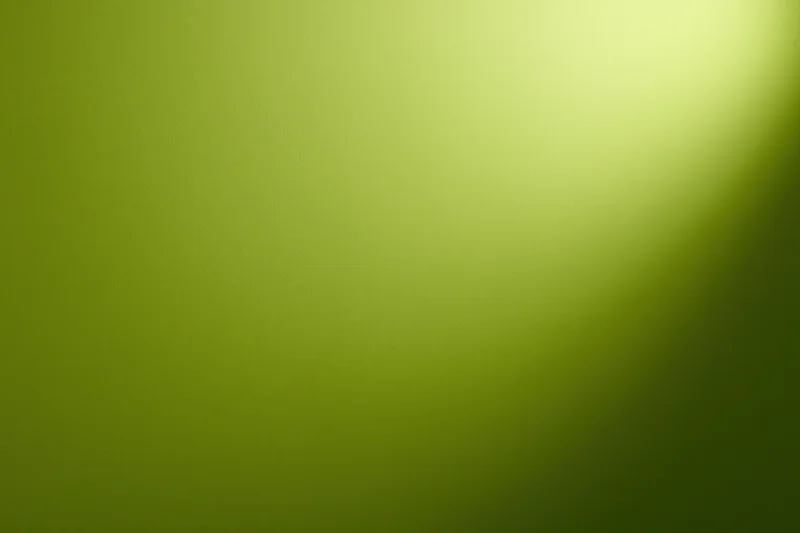 Smooth gradient surface transitioning from lime green to dark green across the frame