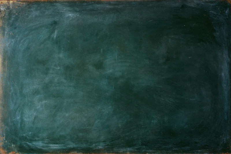 Worn dark green chalkboard surface close-up flat texture shot