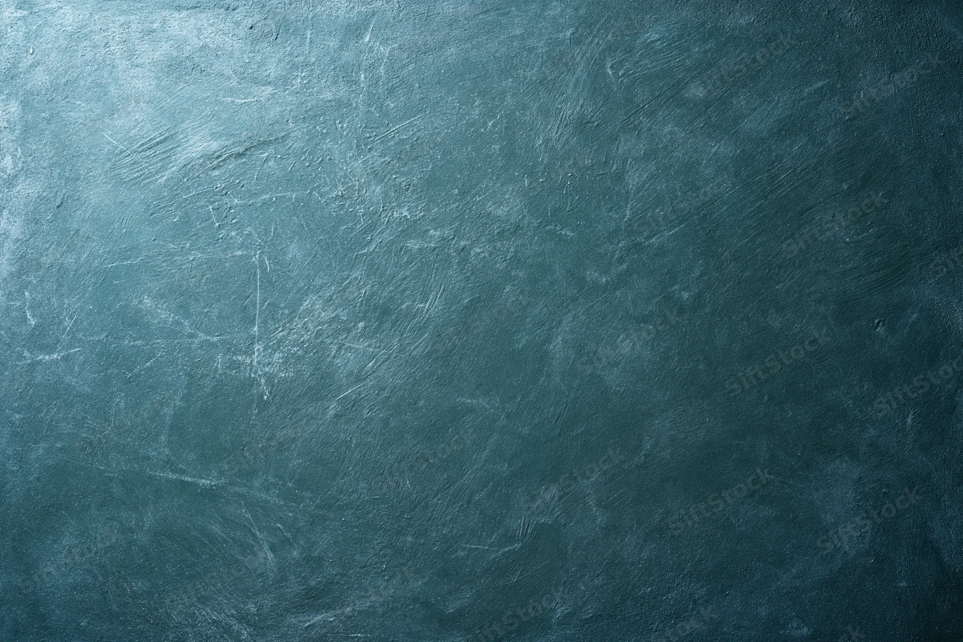 Worn painted concrete wall surface filling the frame