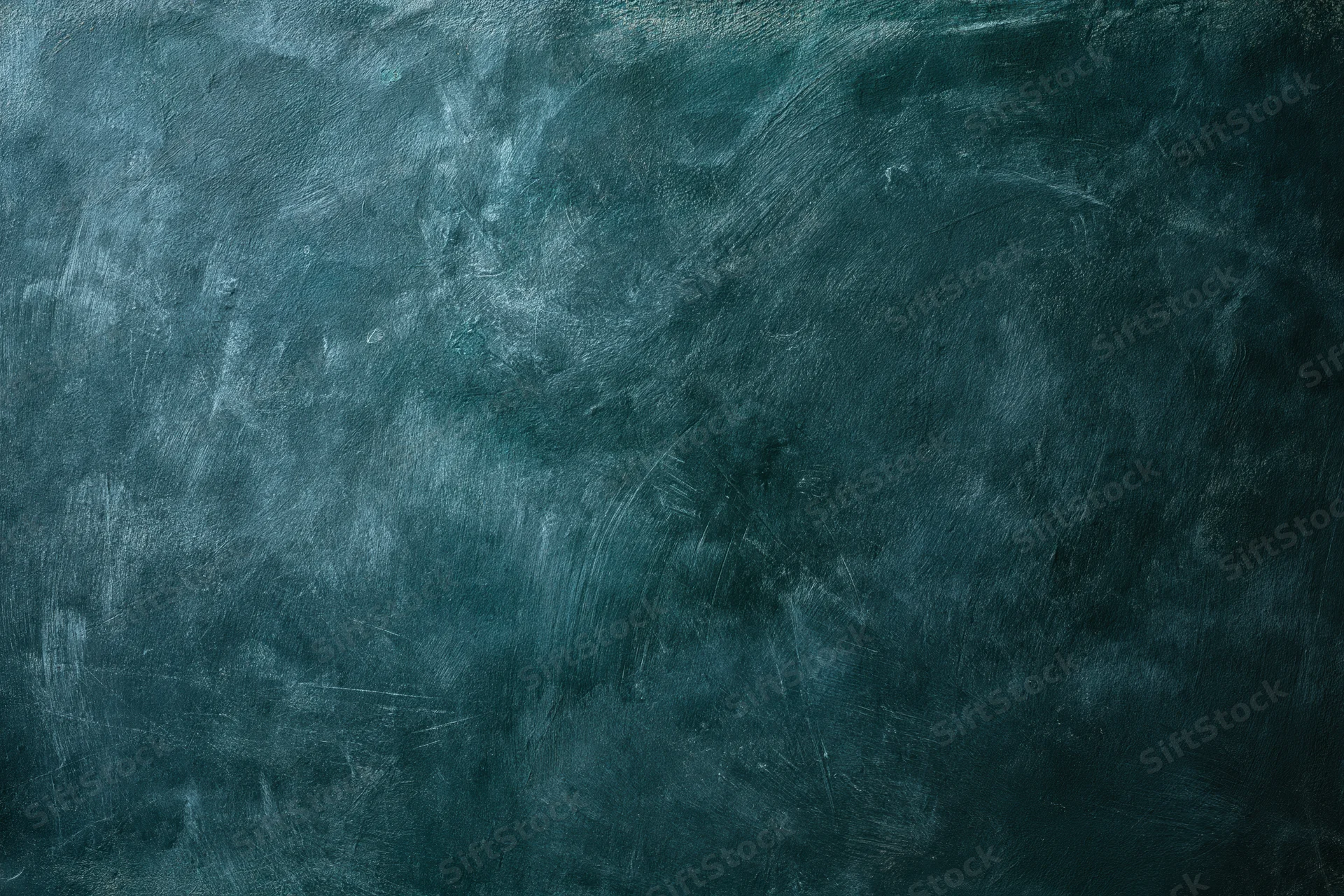 Worn painted concrete wall surface filling the frame