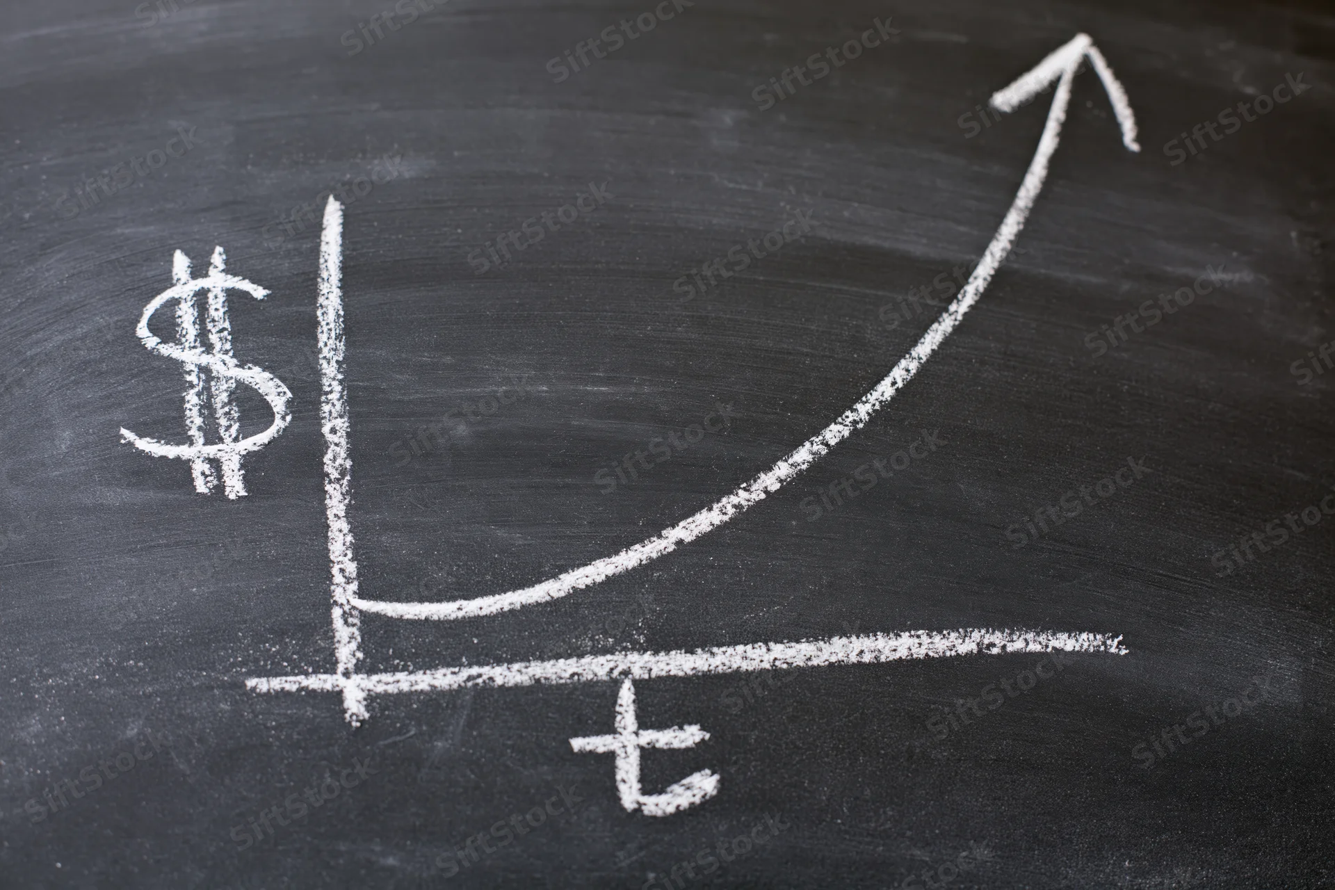 Chalk-drawn exponential growth graph on a blackboard with dollar and time axes