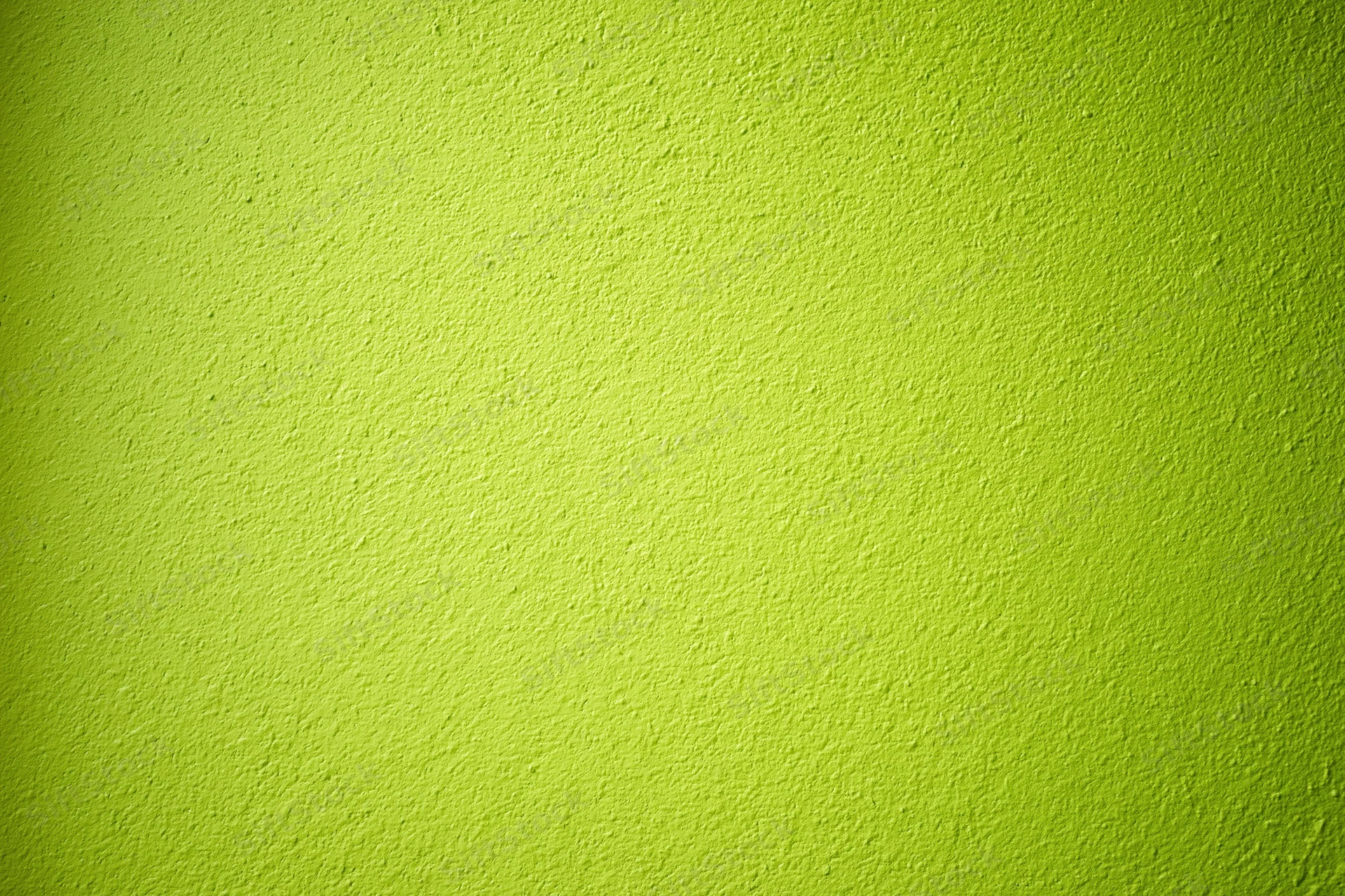 Close-up of lime green painted concrete wall texture