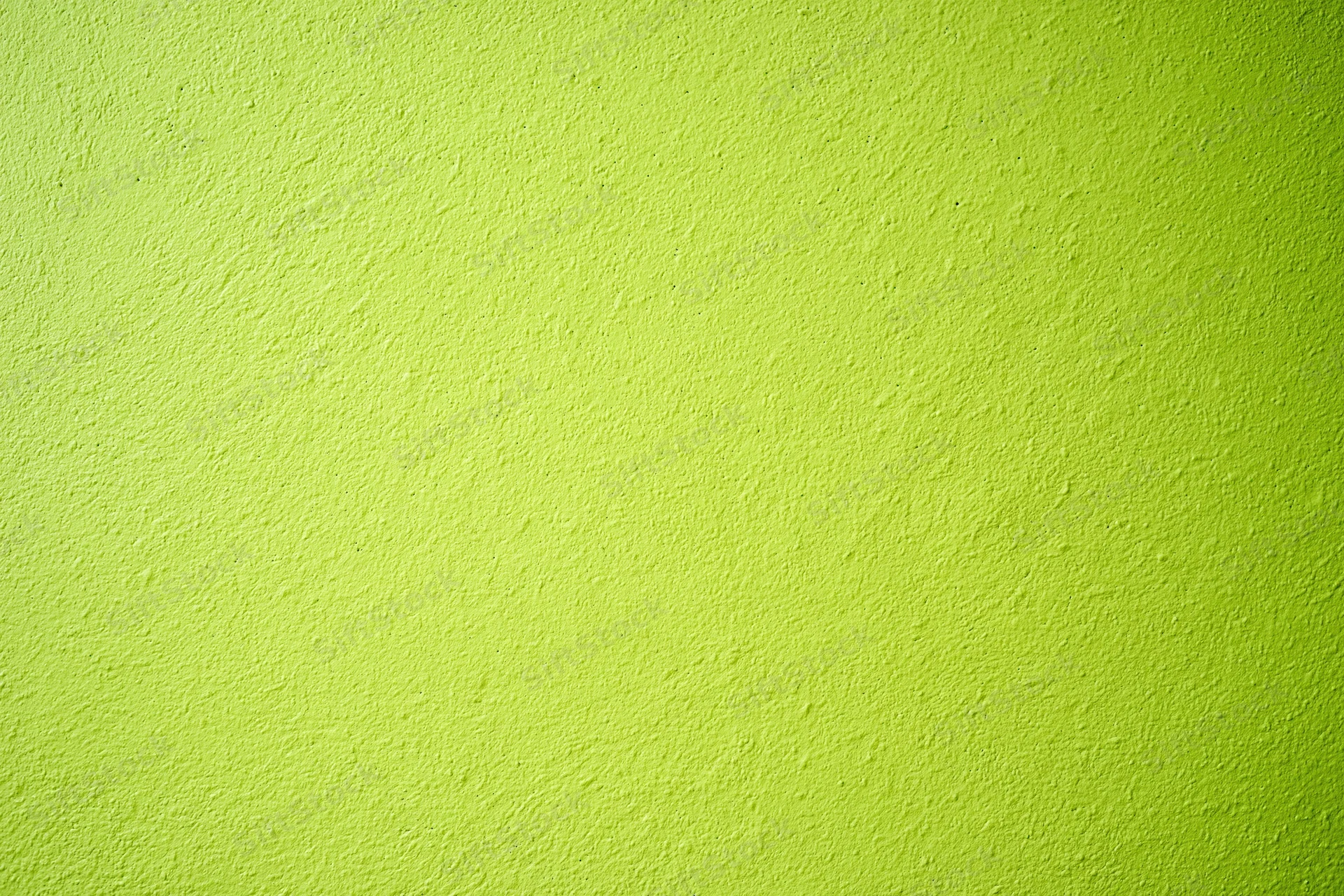 Close-up of lime green painted concrete wall surface