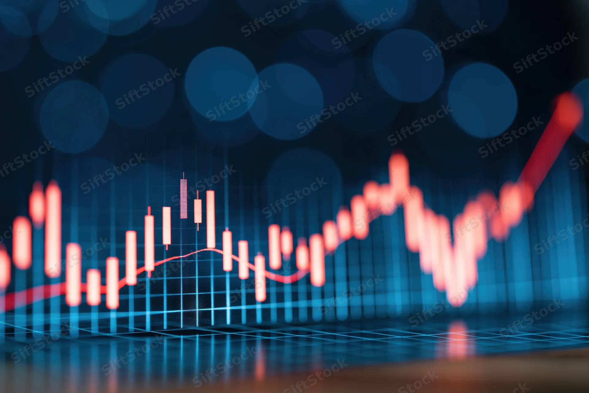 Glowing candlestick chart on digital display showing upward market trend
