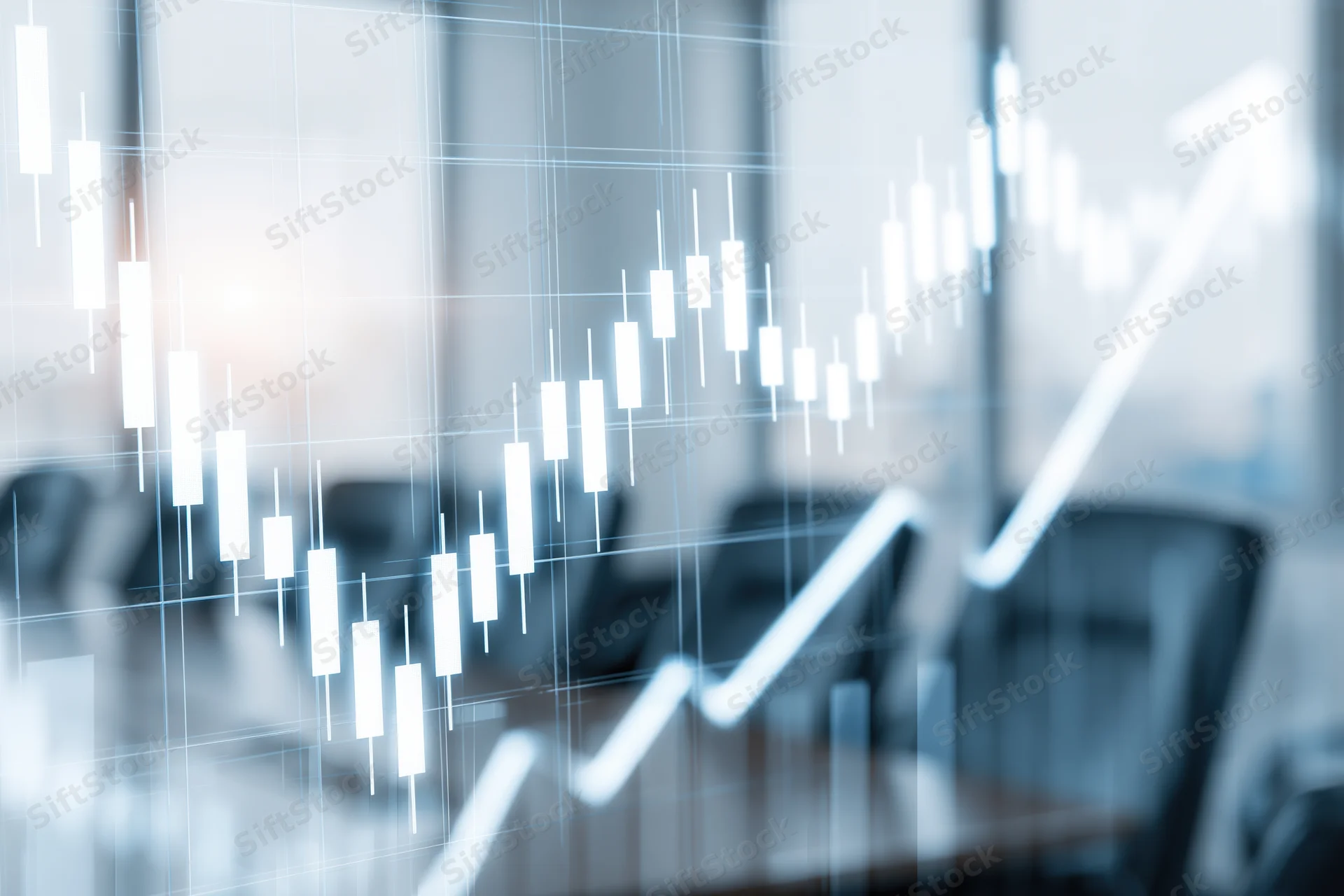 Glowing financial candlestick chart overlaying a blurred office meeting room