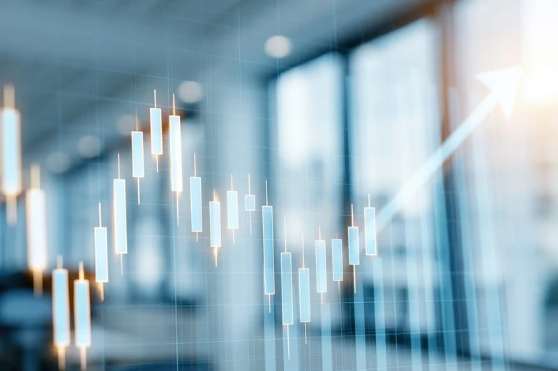 Glowing candlestick chart showing upward trend overlaid on blurred office window view