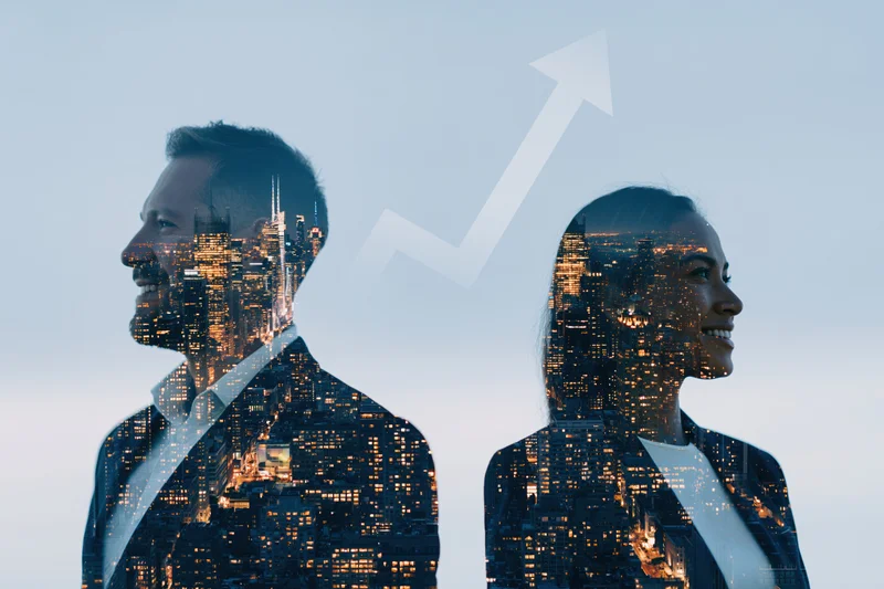 Double exposure of two smiling business professionals with city skyline and upward arrow overlay