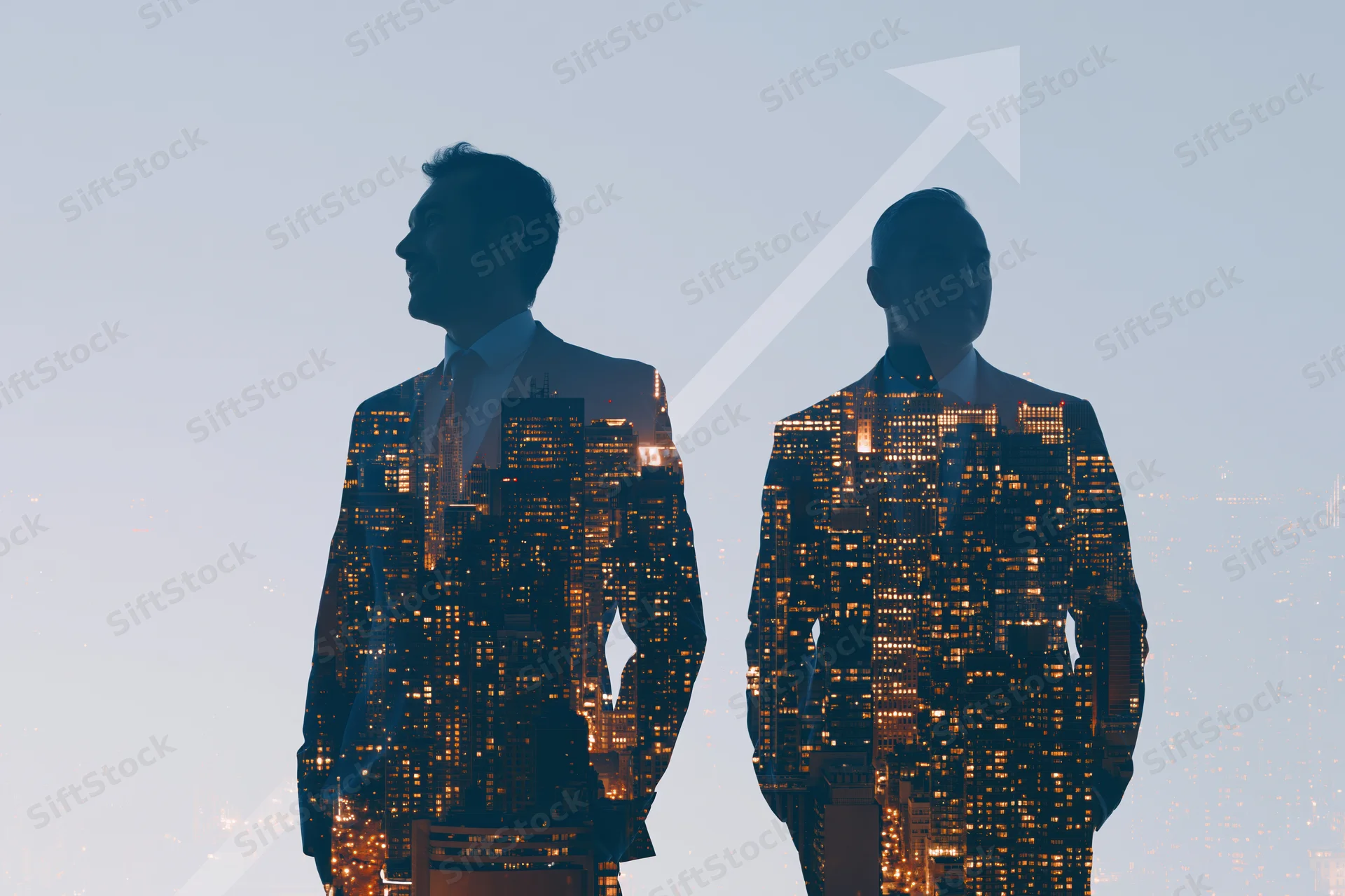 Two business professionals in silhouette with city skyline double exposed inside their suits, showing upward growth arrow in background