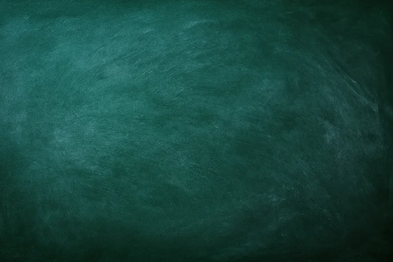 Dark green chalkboard surface filling the frame
