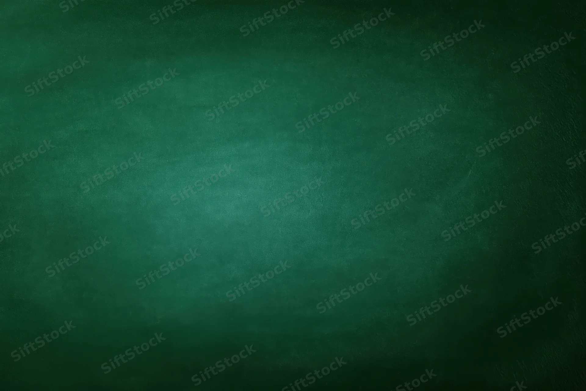 Dark green chalkboard surface filling the frame