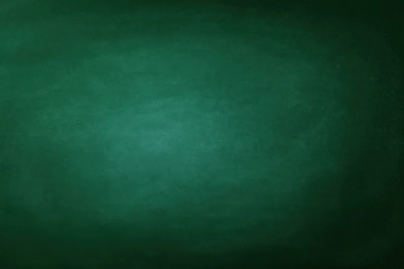 Dark green chalkboard surface filling the frame