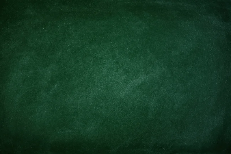 Dark green chalkboard surface filling the frame