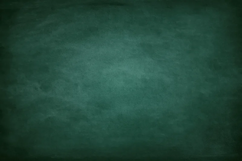 Dark green chalkboard surface filling the frame with textured vintage appearance