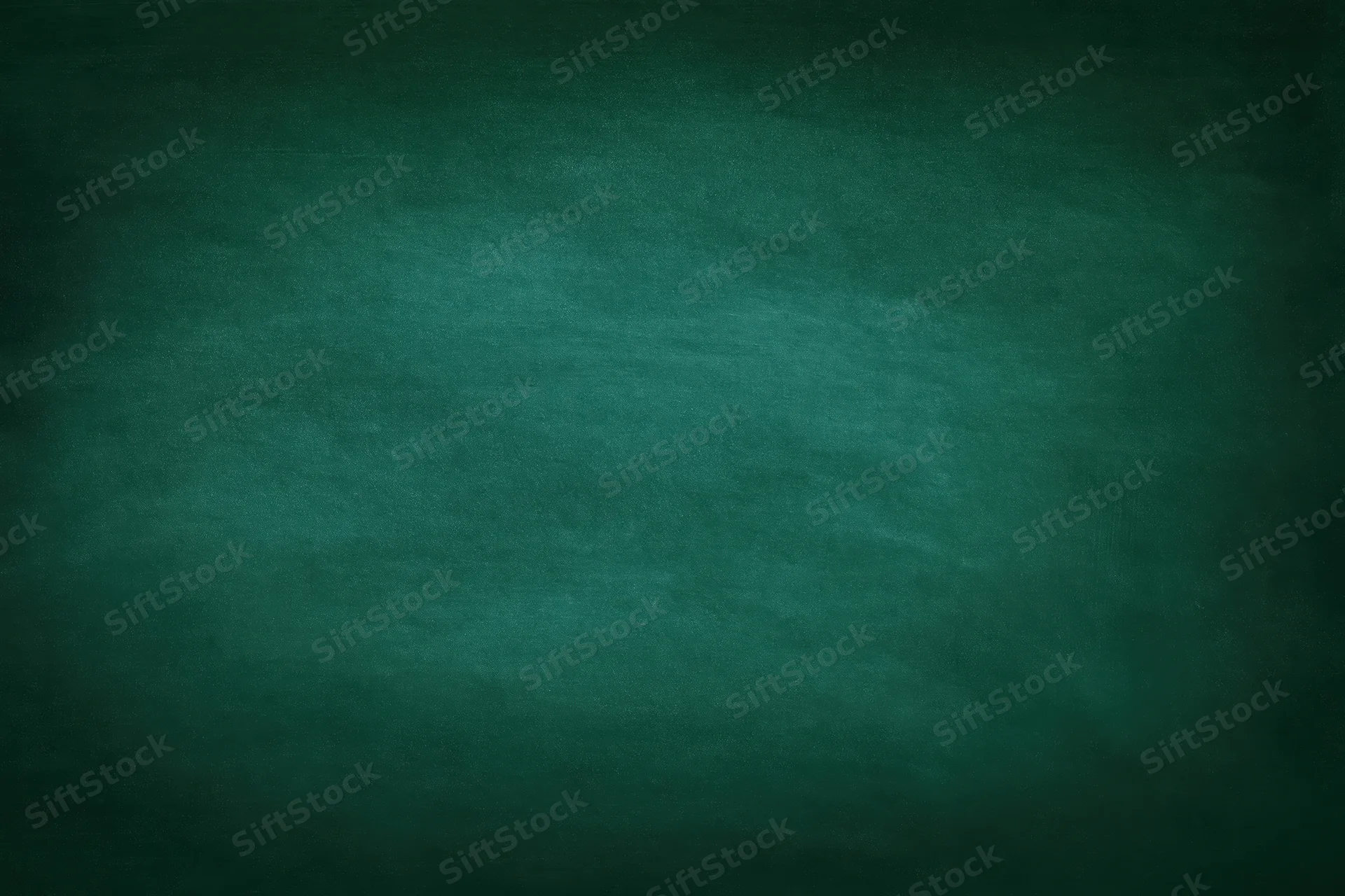 Dark green chalkboard surface filling the frame