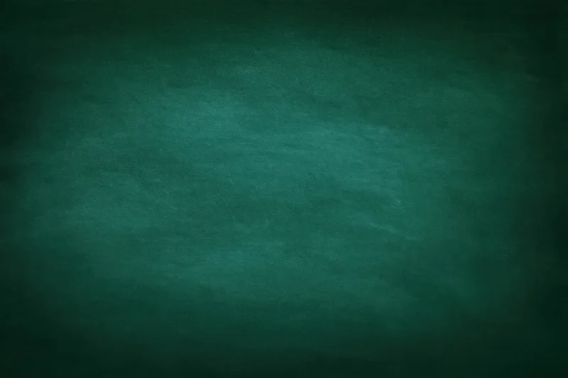 Dark green chalkboard surface filling the frame