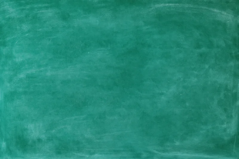 Empty green chalkboard surface filling the frame