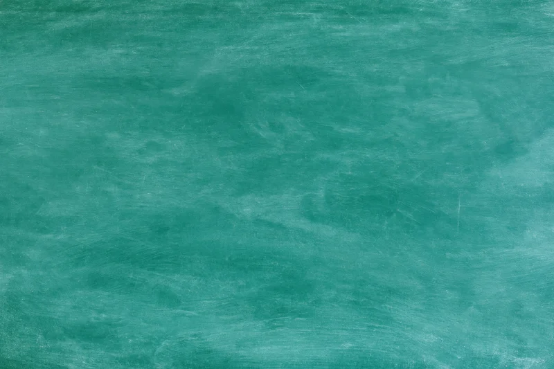 Empty green chalkboard surface filling the frame
