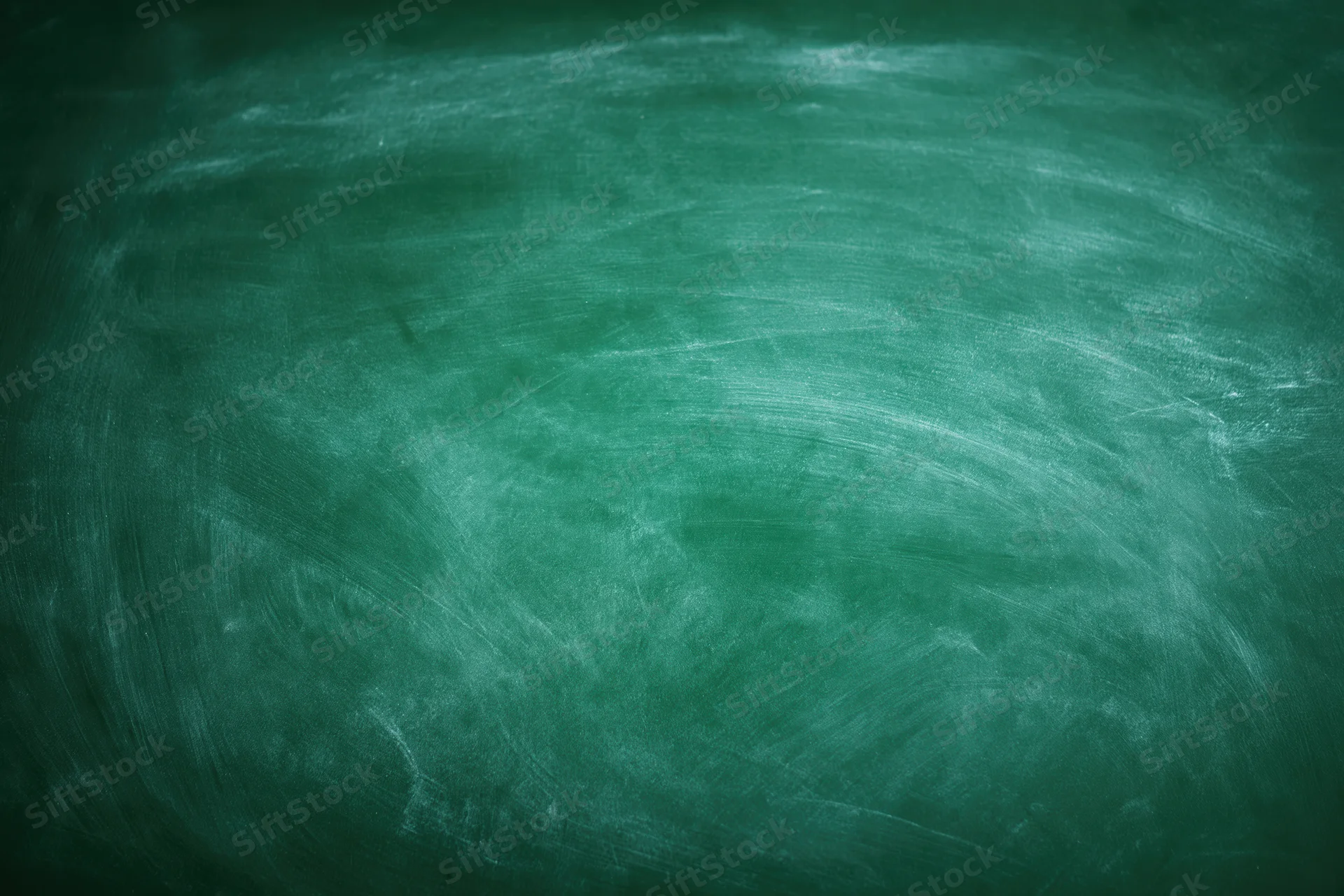 Empty green chalkboard surface filling the frame