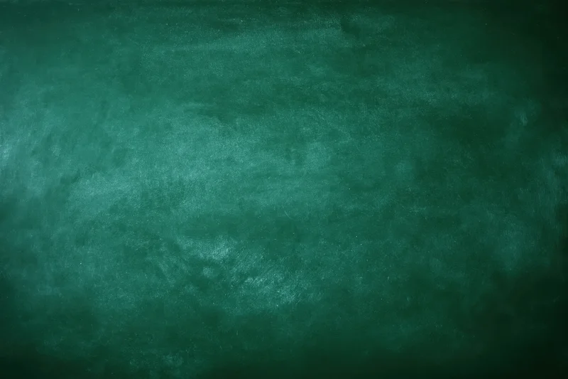 Empty green chalkboard surface filling the frame
