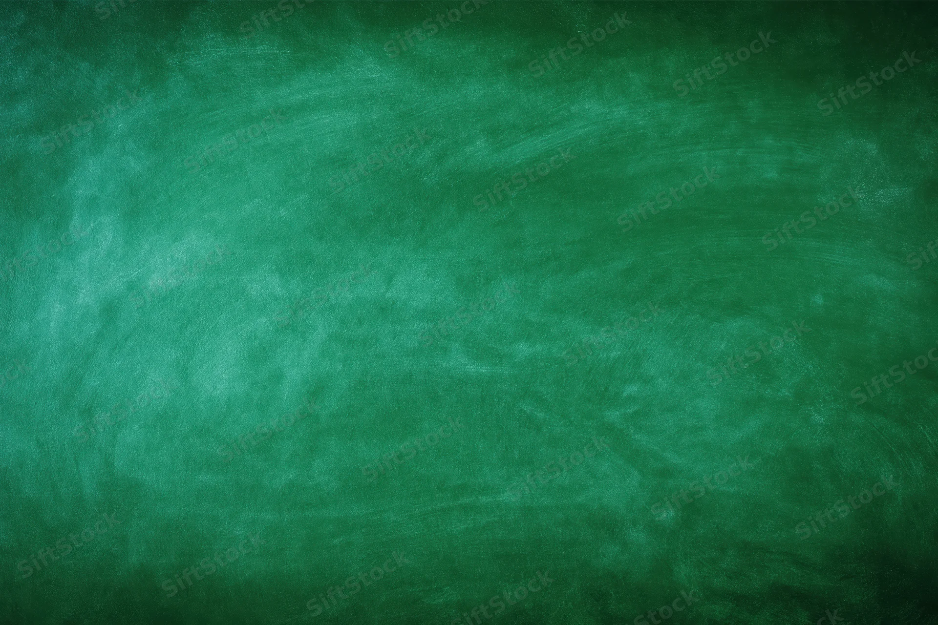 Empty green chalkboard surface filling the frame