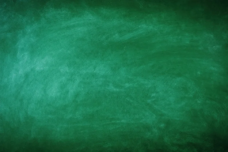 Empty green chalkboard surface filling the frame