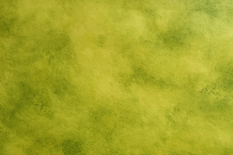 Mottled green painted canvas texture filling the frame