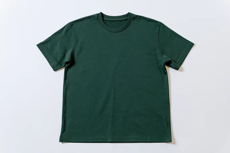 Plain forest green cotton crew-neck t-shirt laid flat on white background