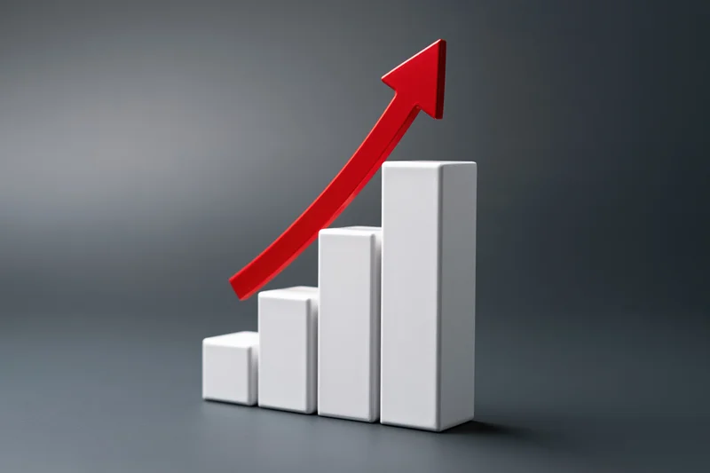 Red arrow rising over ascending white bars on a dark surface