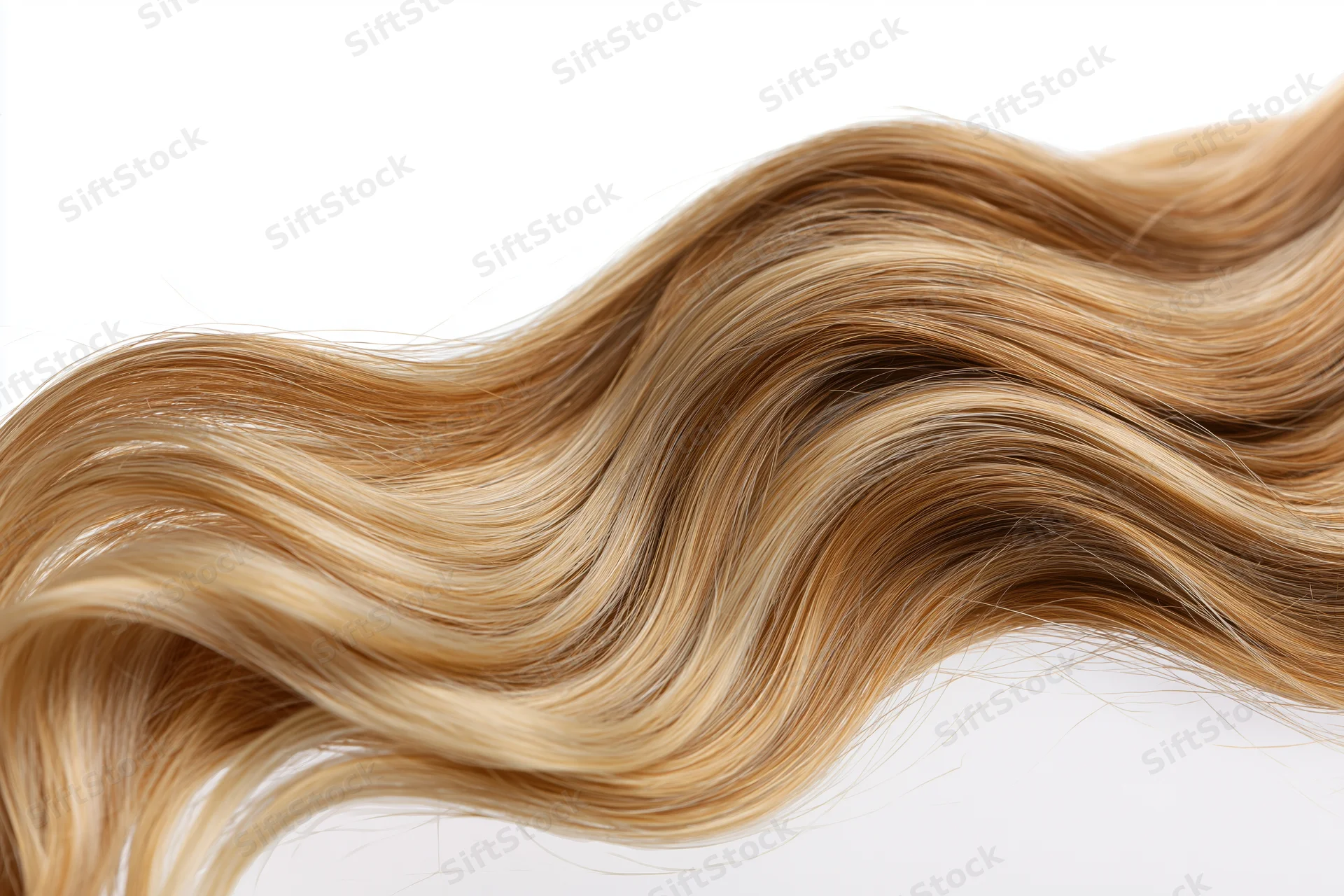 Wavy blonde hair extension floating against white background
