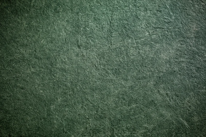 Weathered concrete wall surface filling the frame