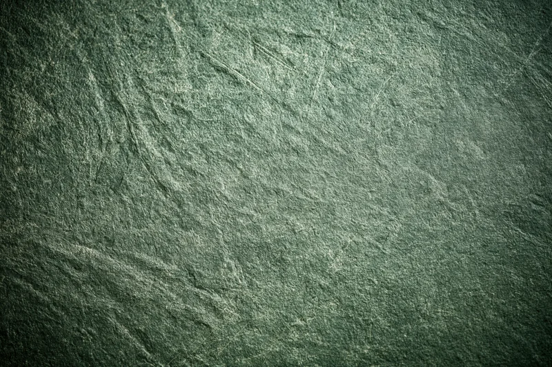 Weathered concrete wall surface filling the frame