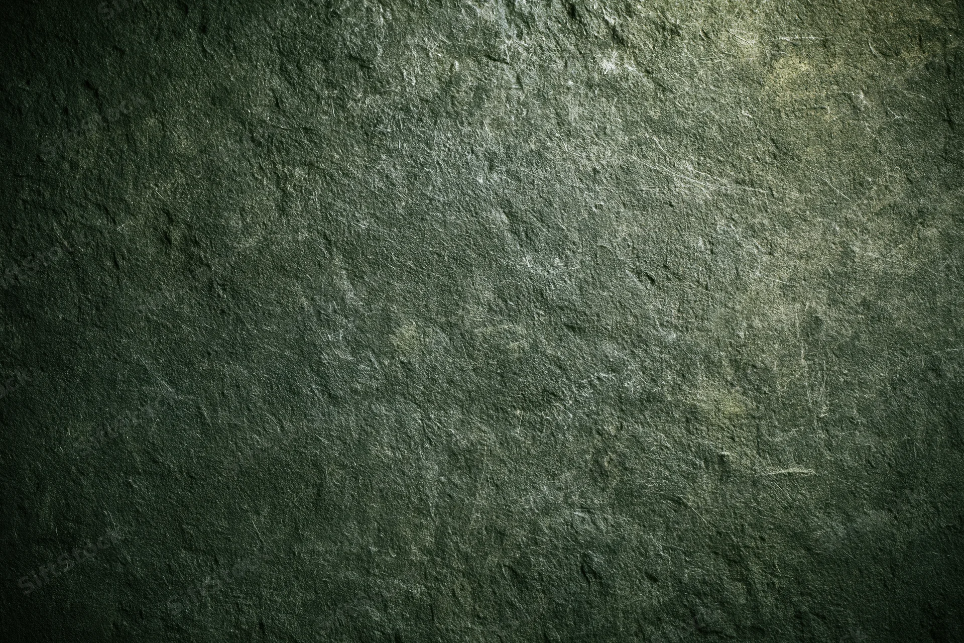 Weathered concrete wall surface filling the frame with textured grunge appearance