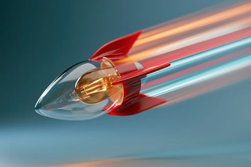 Glass lightbulb with red rocket fins launching at high speed against a blue gradient background