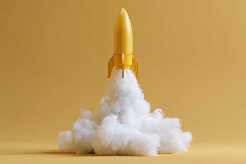 Yellow toy rocket launching upward with billowing white smoke against a solid yellow background