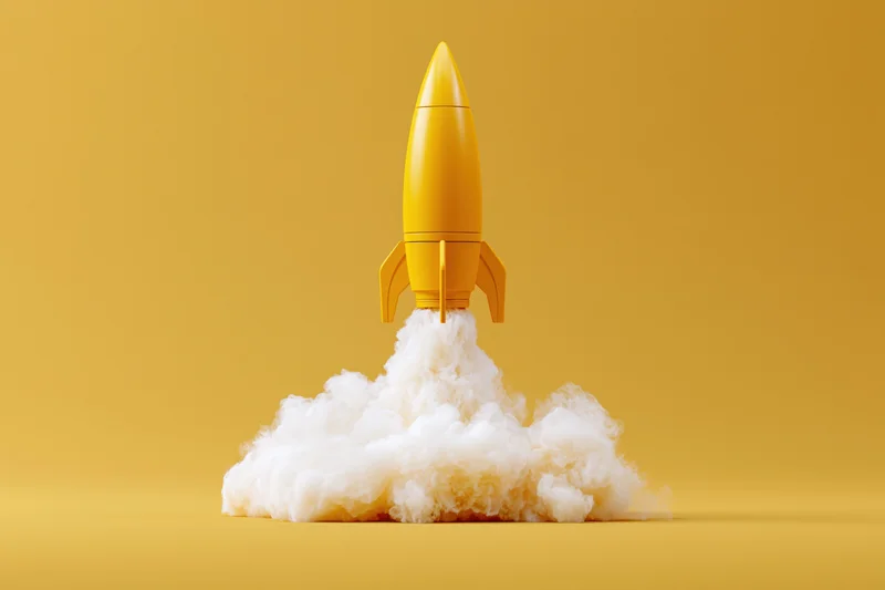 Yellow toy rocket launching upward with billowing smoke on a solid yellow background