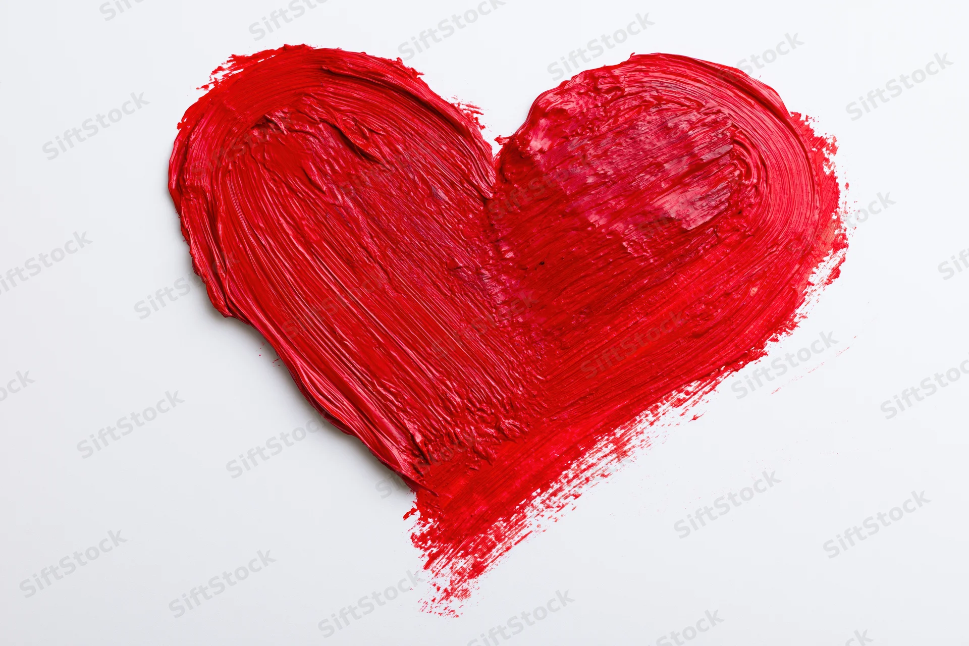 Hand-painted red heart with textured brushstrokes on white background