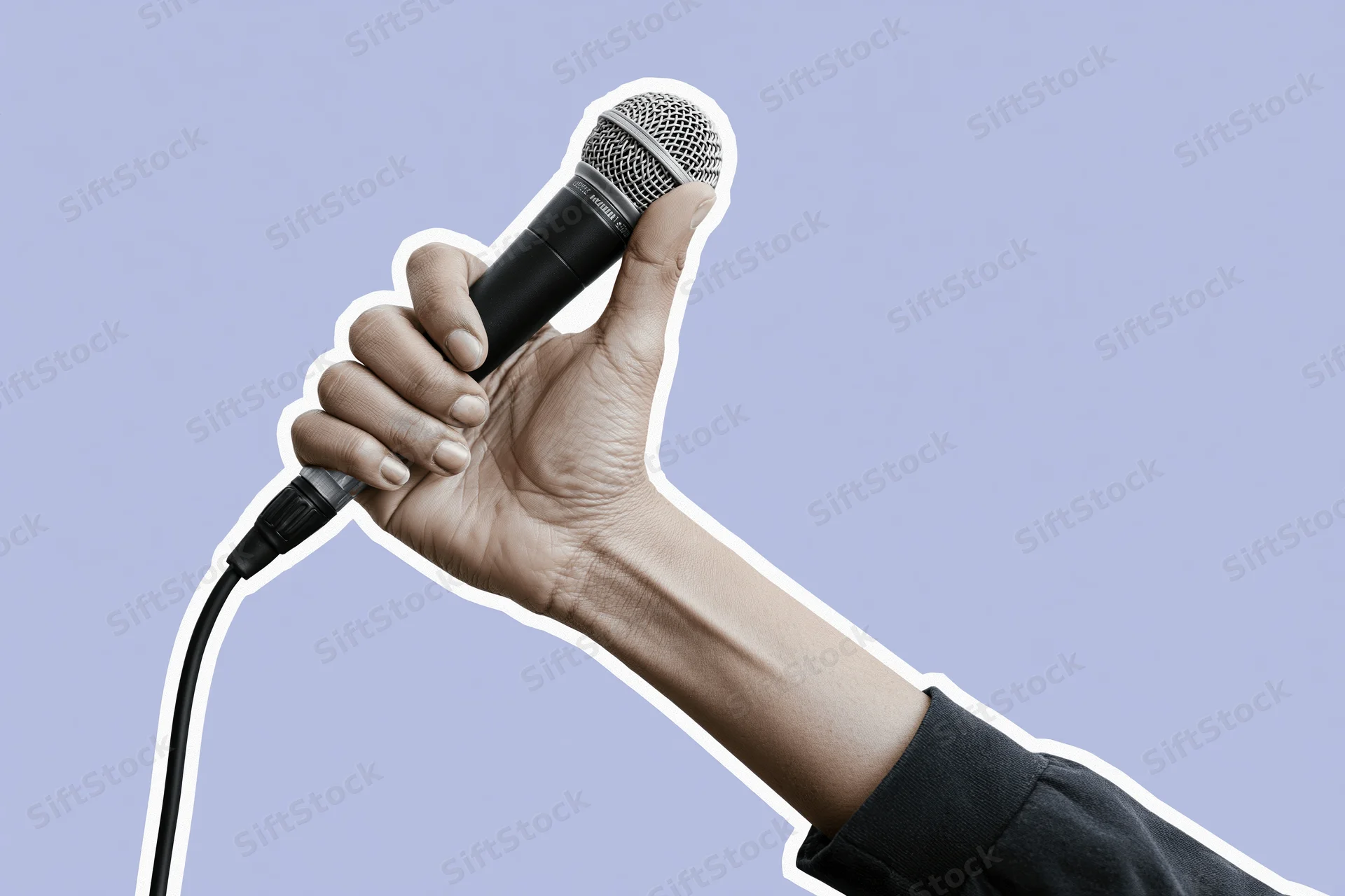 Hand gripping a wired microphone raised upward against a lavender background