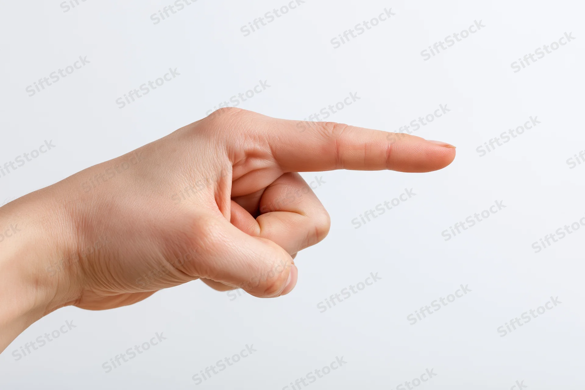 Hand with index finger pointing sideways on white background