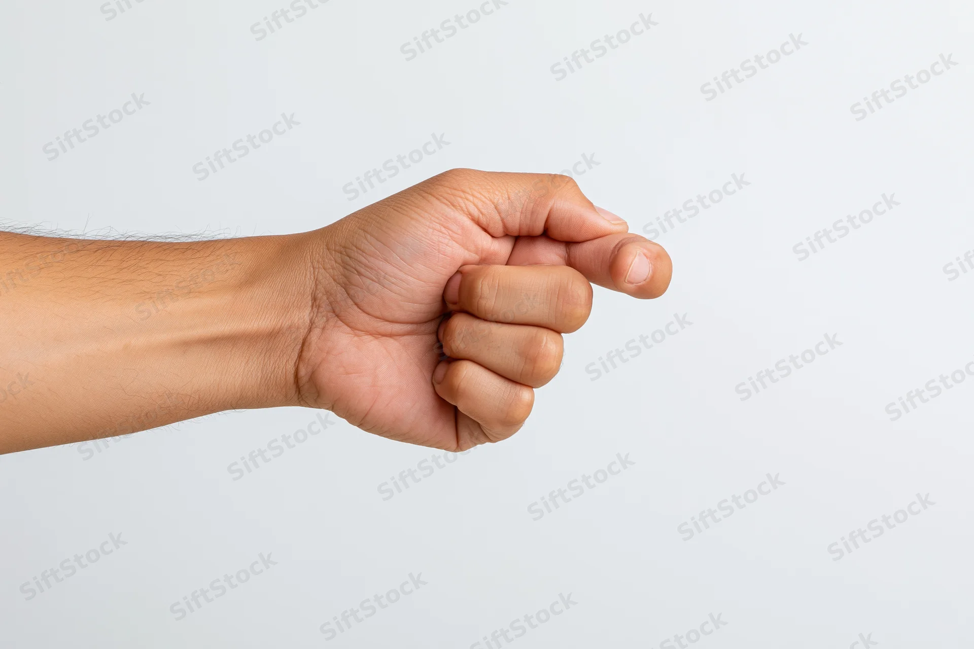 Hand making a pinching gesture with thumb and index finger against a white background
