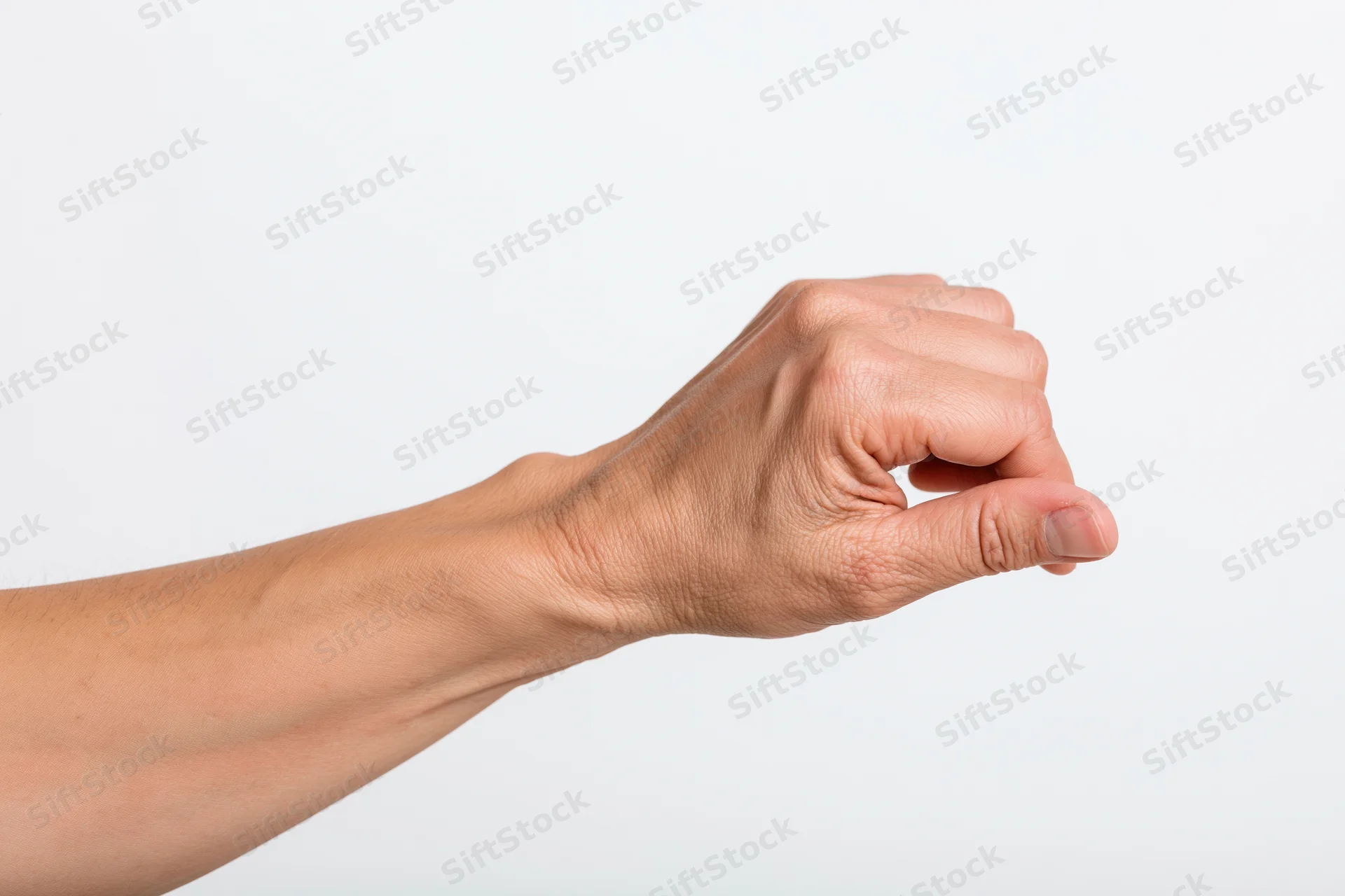 Hand making a pinching gesture with thumb and forefinger against a white background