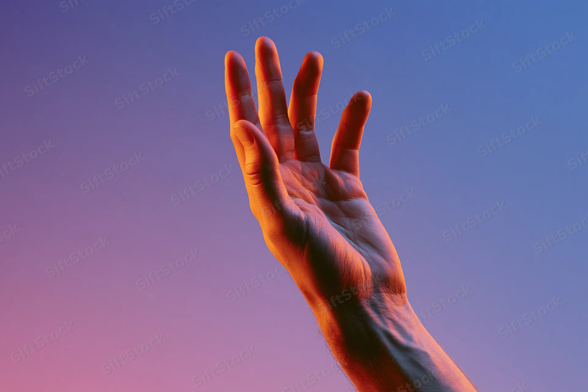 Hand reaching upward against a twilight sky gradient